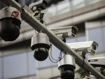 Surveillance cameras manufactured by Hangzhou Hikvision Digital Technology Co. are mounted