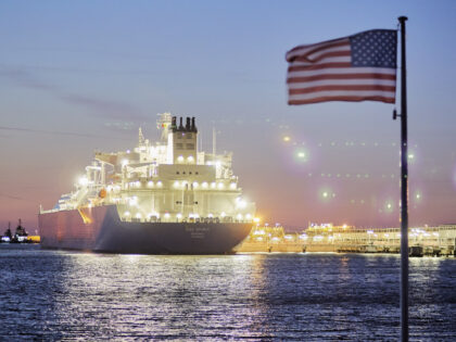 The U.S. national flag and Poland's national flag fly as liquefied natural gas (LNG) tanker Oak Spirit, operated by Teekay Corp., sits docked with Poland's first import of U.S. LNG at the Gazoport terminal, operated by Polskie LNG SA, in Swinoujscie, Poland, on Thursday, July 25, 2019. More freedom gas …