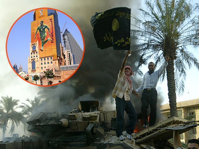 An Iraqi waves a black flag emblazoned with the name Tawhid wal Jihad (Unity and Holy War)