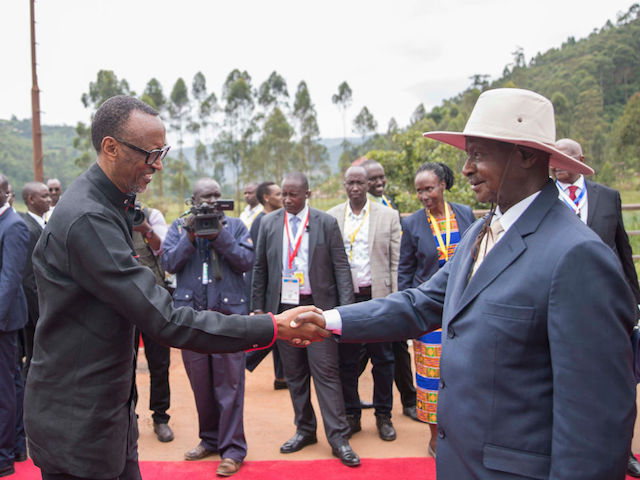 KIGALI, Feb. 22, 2020 -- Rwandan President Paul Kagame L and Ugandan President Yoweri Museveni shake hands during a meeting at the Gatuna-Katuna border crossing between Rwanda and Uganda, on Feb. 21, 2020. The two countries on Friday signed an extradition treaty to ease tension as a common border between the two neighboring countries remains closed for over a year. The treaty, according to the communique issued at the end of the meeting has a legal framework to handle alleged subversive activities practiced by nationals in the territory of the other party. (Photo by Xinhua via Getty)