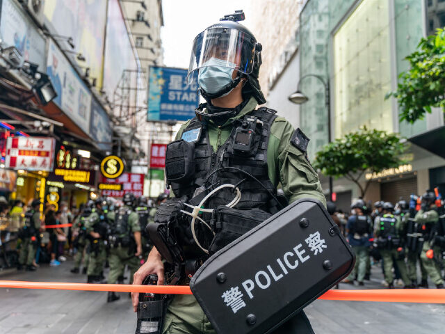 HONG KONG, CHINA - OCTOBER 01: Riot police secure an area on national day in a shopping ar