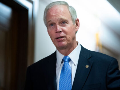 UNITED STATES - DECEMBER 16: Chairman Ron Johnson, R-Wis., talks with a reporter before the Senate Homeland Security and Governmental Affairs Committee hearing titled Examining Irregularities in the 2020 Election, in Dirksen Building on Wednesday, December 16, 2020. (Photo By Tom Williams/CQ-Roll Call, Inc via Getty Images)