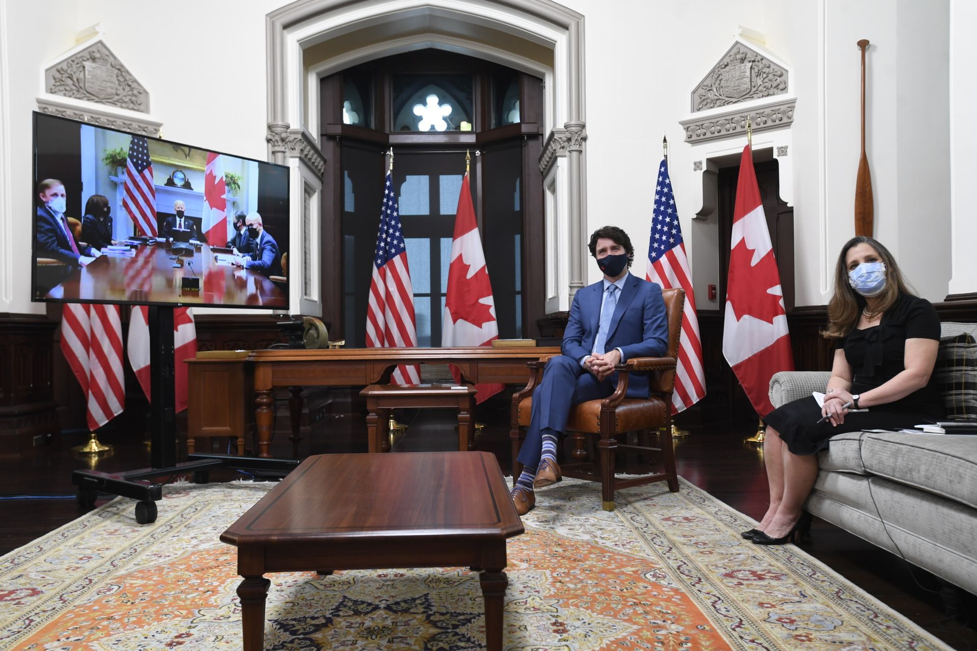 Justin Trudeau, Canada's prime minister, and Chrystia Freeland, Canada's deputy prime minister and minister of finance, attend a virtual meeting with U.S. President Joe Biden in Ottawa, Ontario, Canada, on Tuesday, Feb. 23, 2021. Biden will seek to repair relations with Canada that have been strained by disputes over trade and an oil pipeline as he meets virtually with Trudeau on Tuesday. Photographer: Adrian Wyld/Canadian Press/Bloomberg via Getty Images