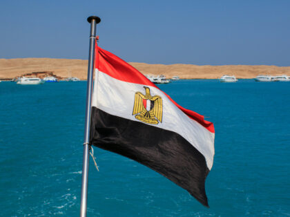 HURGHADA, EGYPT - OCTOBER 31, 2021 - The flag of Egypt is pictured against the turquoise sea in Hurghada, Egypt. (Photo credit should read Serhii Hudak/ Ukrinform/Future Publishing via Getty Images)