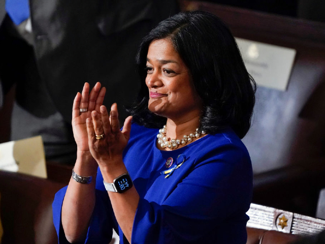WASHINGTON, DC - MARCH 01: Rep. Pramila Jayapal, D-Wash., applauds as President Joe Biden delivers his first State of the Union address to a joint session of Congress, at the Capitol on March 01, 2022 in Washington, DC. During his first State of the Union address, Biden spoke on his administration’s efforts to lead a global response to the Russian invasion of Ukraine, work to curb inflation, and bring the country out of the COVID-19 pandemic. (Photo by J. Scott Applewhite-Pool/Getty Images)