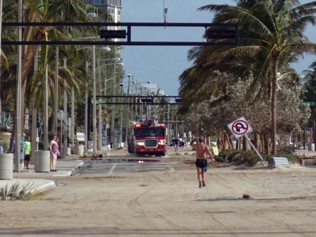 A fire truck makes its way down State Road A1A near Fort Lauderdale beach on Sept. 11, 201