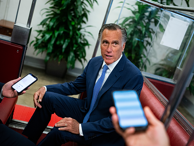 Senator Mitt Romney, a Republican from Utah, speaks to members of the media on the Senate