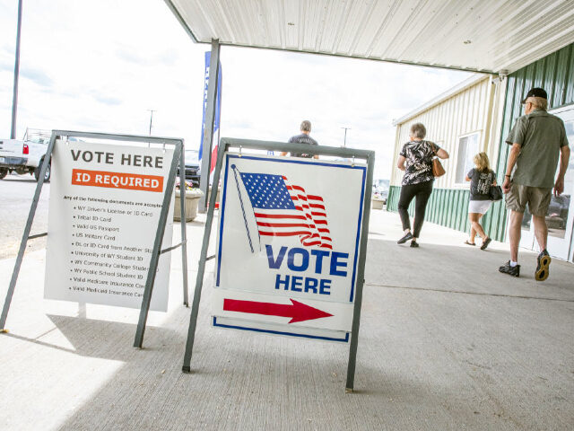 Voters exit a polling location at Event Center at Archer in Cheyenne, Wyoming, US, on Tuesday, Aug. 16, 2022. Liz Cheney, who has held the states sole seat in the US House since 2017, is all but certain to lose to top challenger Harriet Hageman, who leads the incumbent by …