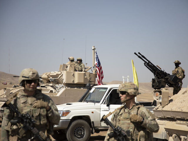 AL-HASAKAH, SYRIA - SEPTEMBER 7: US forces provide military training to PKK, listed as a terrorist organization by Turkiye, the U.S. and the EU, and the YPG militia, which Turkiye regards as a terror group at the Al-Malikiyah district in the Al-Hasakah province, Syria on September 7, 2022. US Special Forces provided armed training to 240 YPG/PKK members in the area, close to the Turkish-Iraqi border. In the training, in which many US-made Bradley armored fighting vehicles were used, the militants were taught about the use of light and medium weapons. US helicopters also did reconnaissance flights in the training area on Tuesday. (Photo by Hedil Amir/Anadolu Agency via Getty Images)