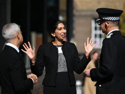 Britain's Home Secretary Suella Braverman (C) speaks with Metropolitan Police Commissioner Mark Rowley (R) and London Mayor Sadiq Khan (L) ahead of a visit from Britain's King Charles III to thank Emergency Service workers for their work and support ahead of the funeral of late Queen Elizabeth II, during a …