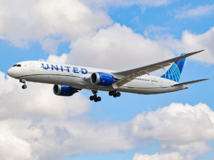 United Airlines Boeing 787 Dreamliner aircraft as seen on final approach flying over the h