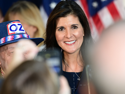 Nikki Haley poses with supporters after an event with Republican Pennsylvania Senate nominee Dr. Mehmet Oz at an event on October 26, 2022 in Harrisburg, Pennsylvania.In the November general election, Oz faces Democratic nominee John Fetterman for the U.S. Senate race in Pennsylvania. (Photo by Mark Makela/Getty Images)