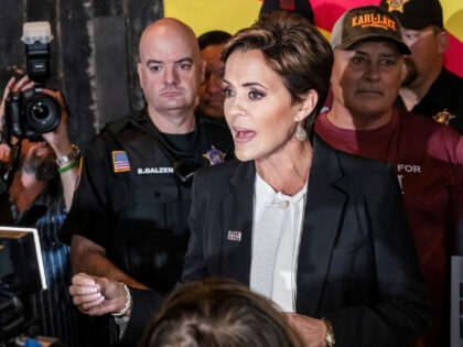 US Republican candidate for Governor of Arizona Kari Lake speaks to the press during her Ask Me Anything Tour hosted by First Responders for Kari in Peoria, Arizona, on October 26, 2022. - With less than two weeks to go before crucial US midterm elections, Republicans hope their narrative of …