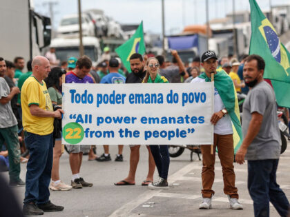 Supporters of President Jair Bolsonaro, mainly truck drivers, block BR-101 highway in Palh