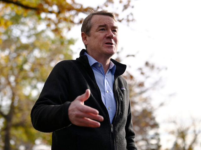 Israel - DENVER, CO - NOVEMBER 2 : Sen. Michael Bennet answers questions from reporters af