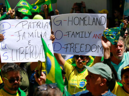 Supporters of Brazilian President Jair Bolsonaro take part in a protest to ask for federal