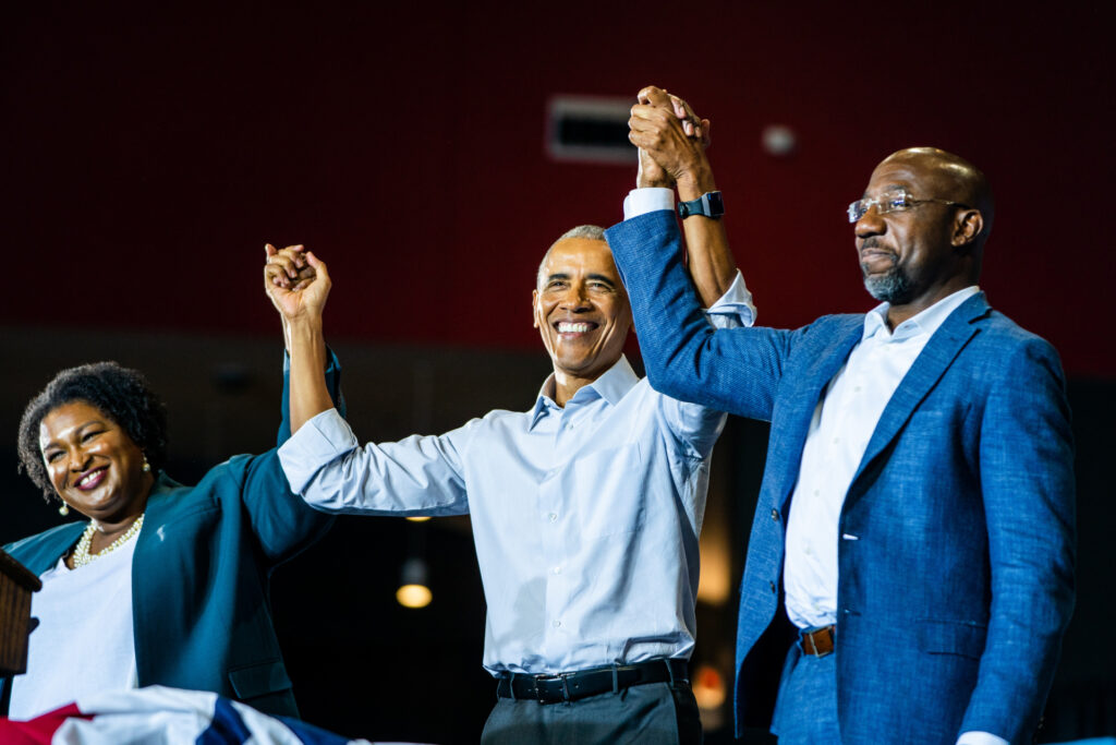 Former US President Barack Obama, Senator Raphael Warnock (D-GA) and Stacey Abrams during a rally at The Gateway Center in College Park, Ga on Friday October 28, 2022. (Photo by Demetrius Freeman/The Washington Post via Getty Images)
