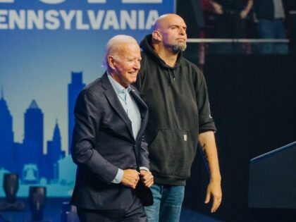 Josh Shapiro, attorney general of Pennsylvania and Democratic candidate for governor, former US President Barack Obama, US President Joe Biden, and John Fetterman, lieutenant governor of Pennsylvania and Democratic senate candidate, arrive to speak during a Democratic National Committee (DNC) rally in Philadelphia, Pennsylvania, US, on Saturday, Nov. 5, 2022. …