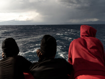 AT SEA - NOVEMBER 05: Rescued irregular migrants are seen on deck after a night under bad weather conditions on the Ocean Viking rescue ship in the Gulf of Catania in international waters on November 05, 2022. (Photo by Vincenzo Circosta/Anadolu Agency via Getty Images)