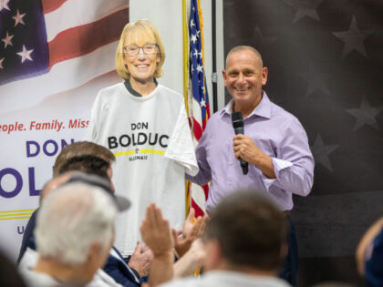 SALEM, NEW HAMPSHIRE - NOVEMBER 06: U.S. Republican Senate candidate Don Bolduc stands next to a life-size cutout of his opponent, U.S. Senator Maggie Hassan (D-NH) during a campaign event on November 06, 2022 in Salem, New Hampshire. Bolduc is running against incumbent Maggie Hassan (D-NH). (Photo by Scott Eisen/Getty …