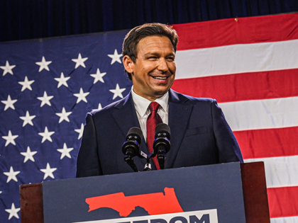 Republican gubernatorial candidate for Florida Ron DeSantis with his wife Casey DeSantis speaks to supporters during an election night watch party at the Convention Center in Tampa, Florida, on November 8, 2022. - Florida Governor Ron DeSantis, who has been tipped as a possible 2024 presidential candidate, was projected as …
