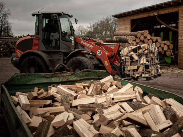 OSTRAVA, CZECH REPUBLIC - NOVEMBER 1: A forklift picks up logs in Ostrava, Czech Republic