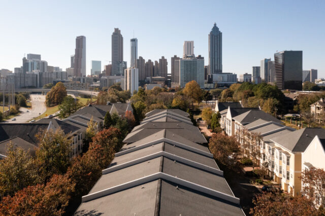 Housing in front of the Atlanta skyline in Atlanta, Georgia, US, on Sunday, Nov. 13, 2022.