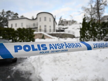 Police secures the area at a house where the Sweden's security service Sapo arrested
