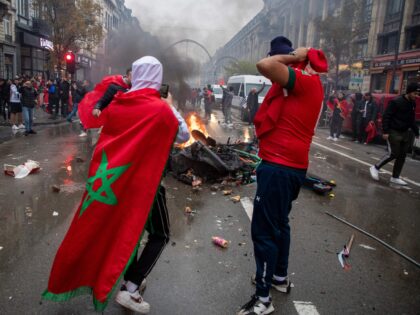 Illustration picture shows incidents during the celebrations of Moroccan supporters and police forces present in the center of Brussels, during a soccer game between Belgium's national team the Red Devils and Morocco, in Group F of the FIFA 2022 World Cup, on Sunday 27 November 2022. BELGA PHOTO NICOLAS MAETERLINCK …