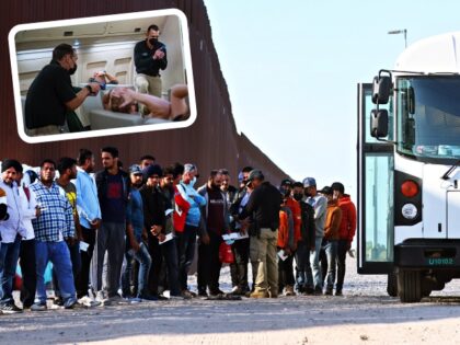 YUMA, ARIZONA - MAY 19: Immigrants wait to board a U.S. Border Patrol bus to be taken for