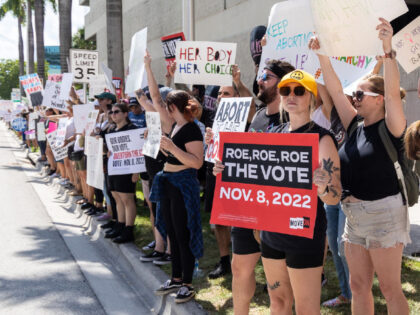 FORT LAUDERDALE, FLORIDA - JULY 13: An abortion rights activist holds a sign at a protest in support of abortion access, March To Roe The Vote And Send A Message To Florida Politicians That Abortion Access Must Be Protected And Defended, on July 13, 2022 in Fort Lauderdale, Florida. (Photo …