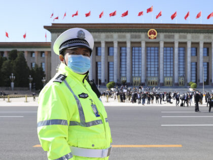 BEIJING, CHINA - OCTOBER 16: Traffic police keeps watch on Tiananmen Square after the opening session of the 20th National Congress of the Communist Party of China (CPC) at the Great Hall of the People on October 16, 2022 in Beijing, China. More than 2,200 delegates, representing more than 96 …