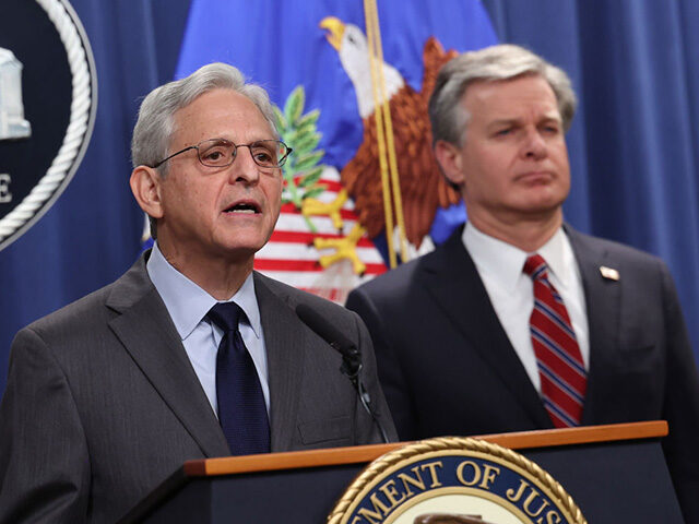 WASHINGTON, DC - OCTOBER 24: U.S. Attorney General Merrick Garland (L) and F.B.I. Director Christopher Wray hold a press conference at the U.S. Department of Justice on on October 24, 2022 in Washington, DC. The Justice Department announced it has charged 13 individuals, including members of the Chinese intelligence and …