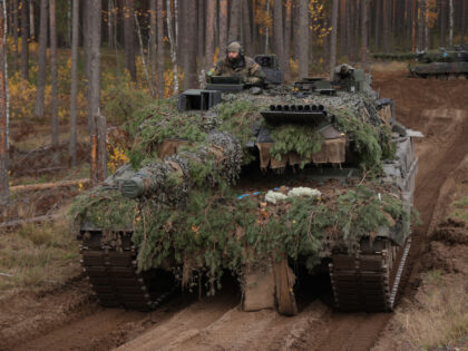 PABRADE, LITHUANIA - OCTOBER 27: Two Leopard 2A6 main battle tanks of the Bundeswehr, the German armed forces, participate in the NATO Iron Wolf military exercises on October 27, 2022 in Pabrade, Lithuania. Germany leads a NATO contingent of troops in Lithuania under the Enhanced Forward Presence (eFP) battle group, …