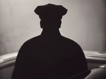 Silhouette of police officer