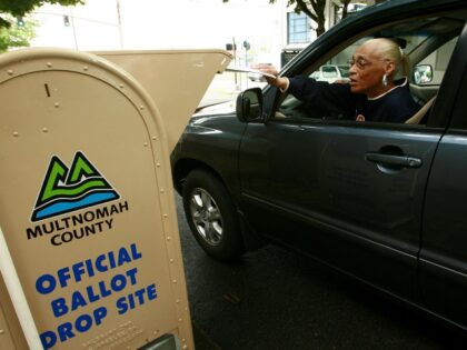 PORTLAND, OR - MAY 20: Voters drop off ballots in Portland, OR. Barack Obama is the favo