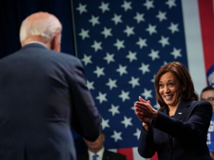 US Vice President Kamala Harris applauds President Joe Biden during an event hosted by the