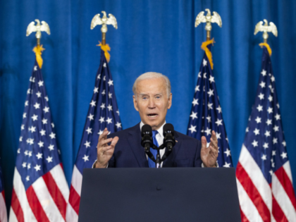 US President Joe Biden speaks at a Democratic National Committee event in Washington, DC, US, on Wednesday, Nov. 2, 2022. Biden issued a fresh warning about threats to US democracy less than a week before Election Day. Photographer: Jim Lo Scalzo/EPA/Bloomberg via Getty Images
