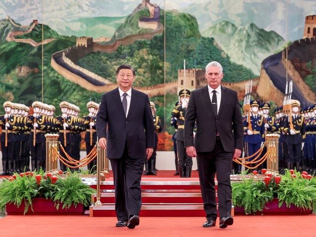 Xi Jinping, general secretary of the Communist Party of China CPC Central Committee and Chinese president, holds a ceremony to welcome Miguel Diaz-Canel Bermudez, first secretary of the Central Committee of the Communist Party of Cuba and Cuban president, prior to their talks at the Great Hall of the People …