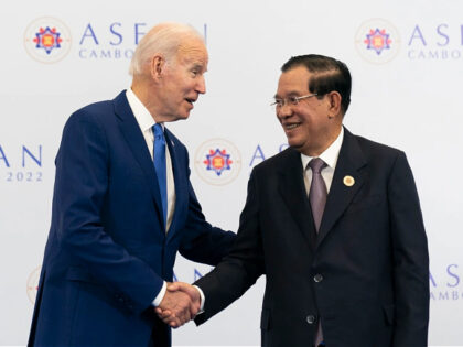 FILE - U.S. President Joe Biden shakes hands with Cambodian Prime Minister Hun Sen before their meeting during the Association of Southeast Asian Nations (ASEAN) summit, Saturday, Nov. 12, 2022, in Phnom Penh, Cambodia. Hun Sen said Tuesday, Nov. 15, 2022, he has tested positive for COVID-19 at the Group …