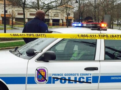 Police Shooting Maryland Prince George's County police block the road to the police station, Monday morning, March 14, 2016 in Hyattsville, Md. Police and the public were seeking answers Monday after a gunman opened fire outside a police station Sunday afternoon in a Maryland suburb of the nation's capital, killing …