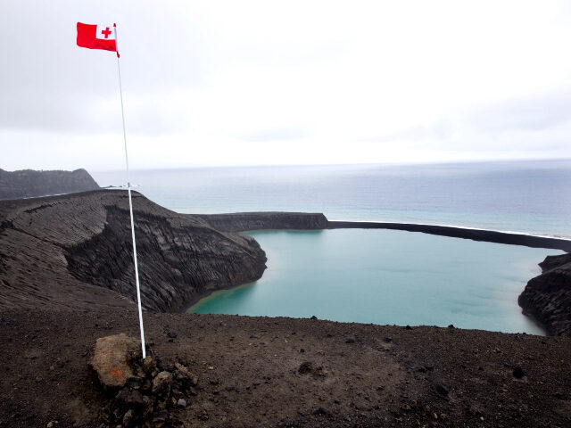 The national flag of Tonga flies over the newest island on Earth, July 10, 2015. The gover