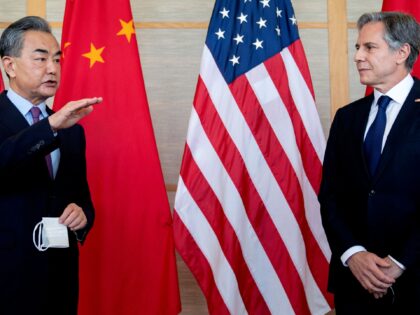 US Secretary of State Antony Blinken (R) and China's Foreign Minister Wang Yi attend a mee