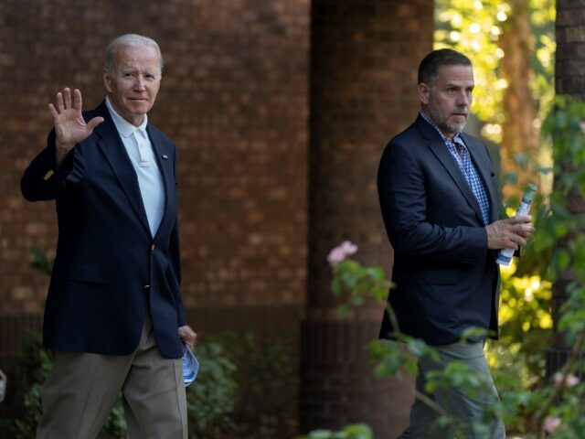 President Joe Biden with his son Hunter Biden waves as they leave Holy Spirit Catholic Church in Johns Island, S.C., after attending a Mass, Saturday, Aug. 13, 2022. Biden is in Kiawah Island with his family on vacation. (AP Photo/Manuel Balce Ceneta)