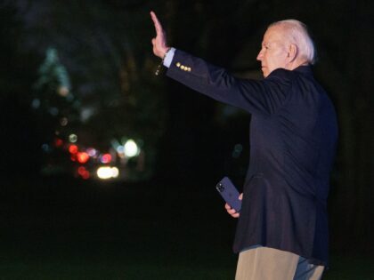 US President Joe Biden waves as he makes his way to board Marine One on the South Lawn before departing from the White House in Washington, DC on November 10, 2022. - Biden is travelling to Phnom Penh, Cambodia, and Bali, Indonesia, to participate in the ASEAN and G20 suummits. …