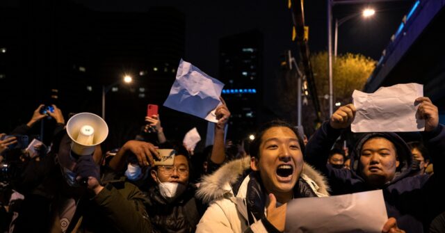 Police in China Arrest, Beat BBC Journalist Covering Coronavirus Protests