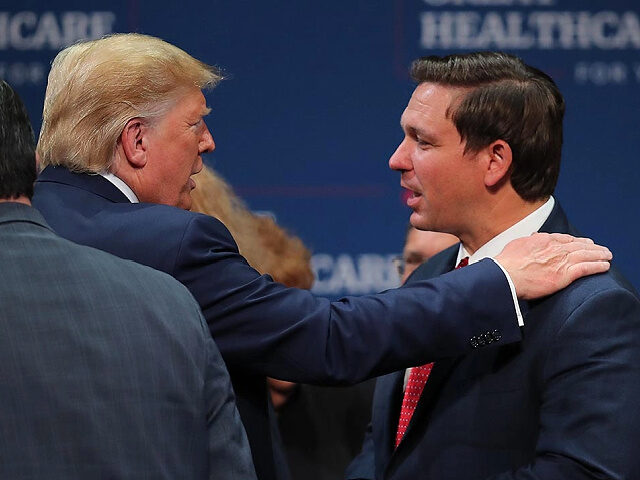 THE VILLAGES, FLORIDA - OCTOBER 03: President Donald Trump speaks with Florida Gov. Ron DeSantis during an event at the Sharon L. Morse Performing Arts Center on October 03, 2019 in The Villages, Florida. President Trump spoke at the event about Medicare, and signed an executive order calling for further …