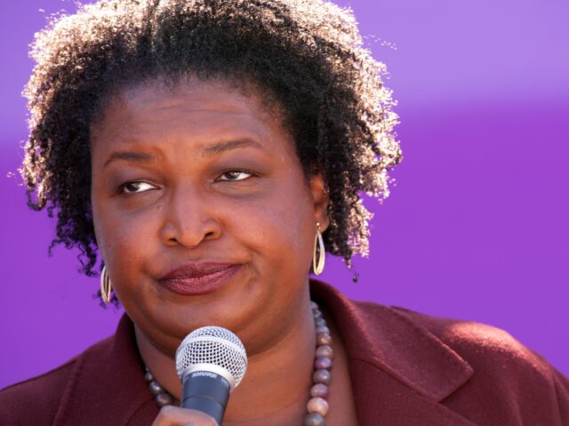 STATESBORO, GEORGIA - NOVEMBER 04: Democratic Georgia gubernatorial candidate Stacey Abrams speaks to voters during a stop of her statewide campaign bus tour on November 4, 2022 in Statesboro, Georgia. Abrams continued to campaign to unseat her Republican rival Gov. Brian Kemp (R-GA) in the upcoming midterm election. (Photo by …
