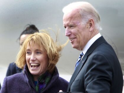 New Hampshire Gov. Gov. Maggie Hassan greets Vice President Joe Biden as he arrives at the Manchester Airport, Tuesday, March 25, 2014, in Manchester, N.H. Biden is making the rounds in this key political state critical to the Democrats' hopes of holding onto the Senate majority_and perhaps to Biden's own …