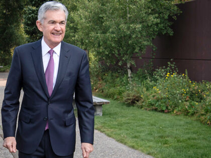 Jerome Powell, chairman of the U.S. Federal Reserve, walks the grounds during the Jackson